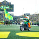 The Oregon Duck rides the motorcycle to lead the Ducks onto the field before kickoff against Washington. 